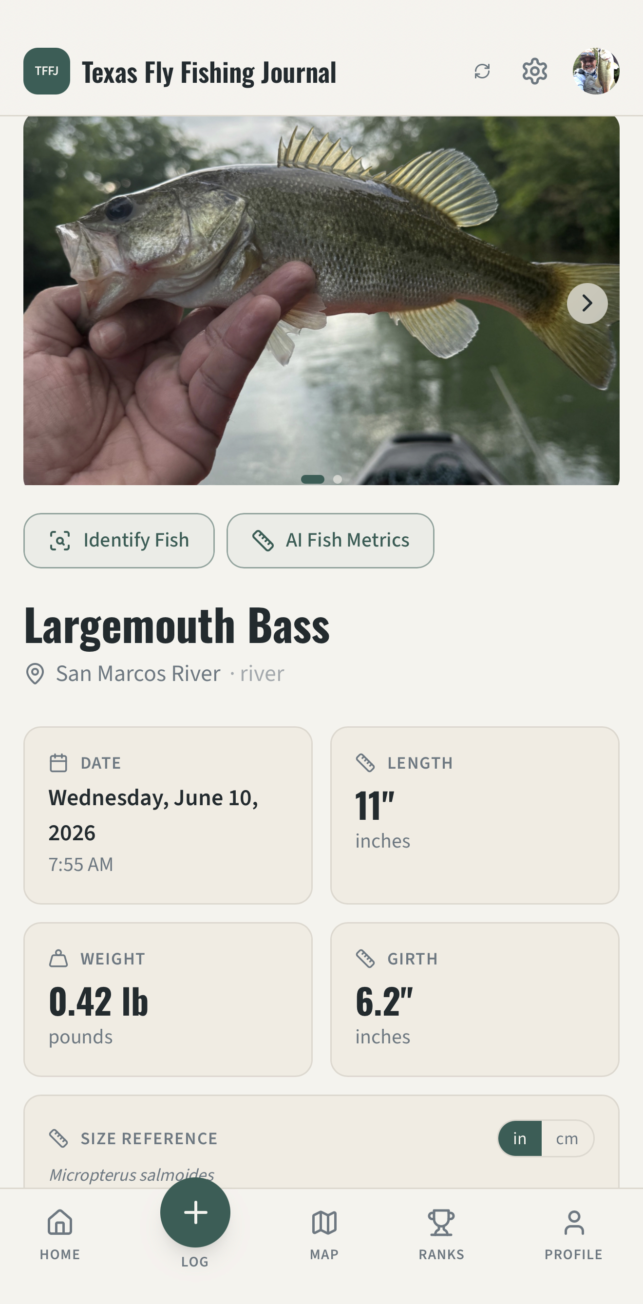 The catch detail screen showing length, weight, and girth estimated for a Largemouth Bass.